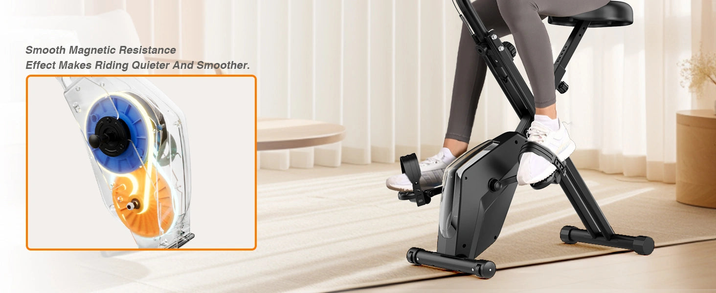 Persona che utilizza una cyclette con resistenza magnetica con primo piano del meccanismo di resistenza.